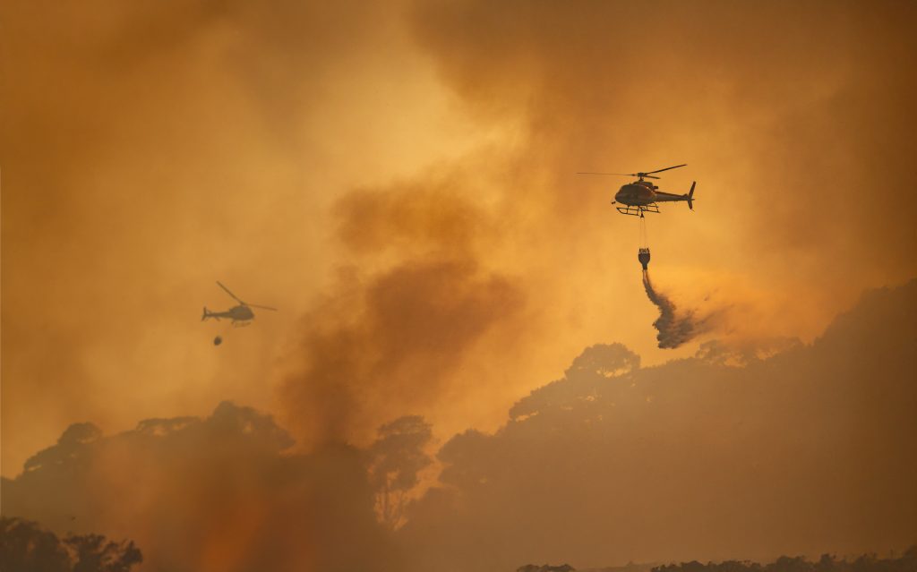 Fire fighting helicopter carry water bucket to extinguish the forest fire - When summer storms, heat emergencies, or regional disasters strike, customers don’t just check your website—they call